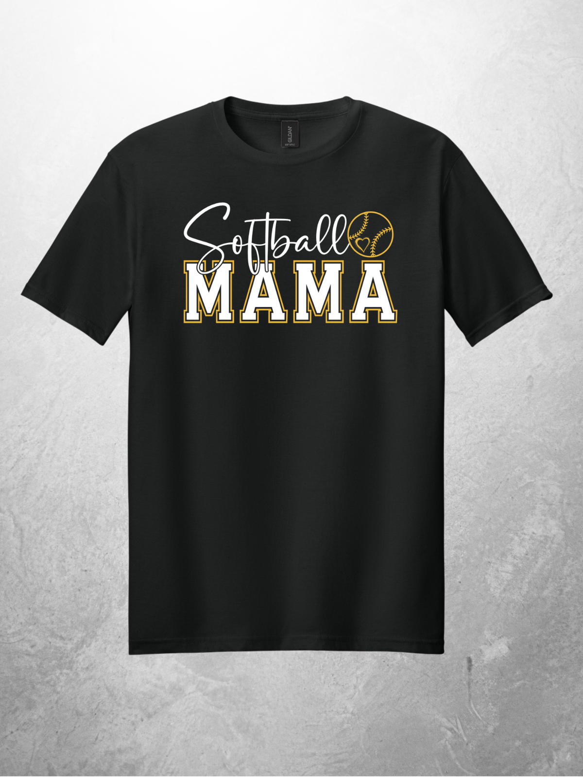 Softball Mama graphic on black unisex tee, light gray studio background
